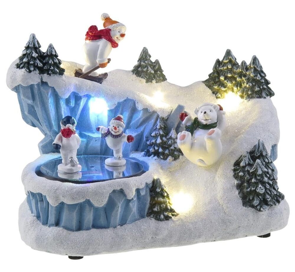8826 North Pole Scene with Spinning Snowman, LED Lights and 8 melodies. A